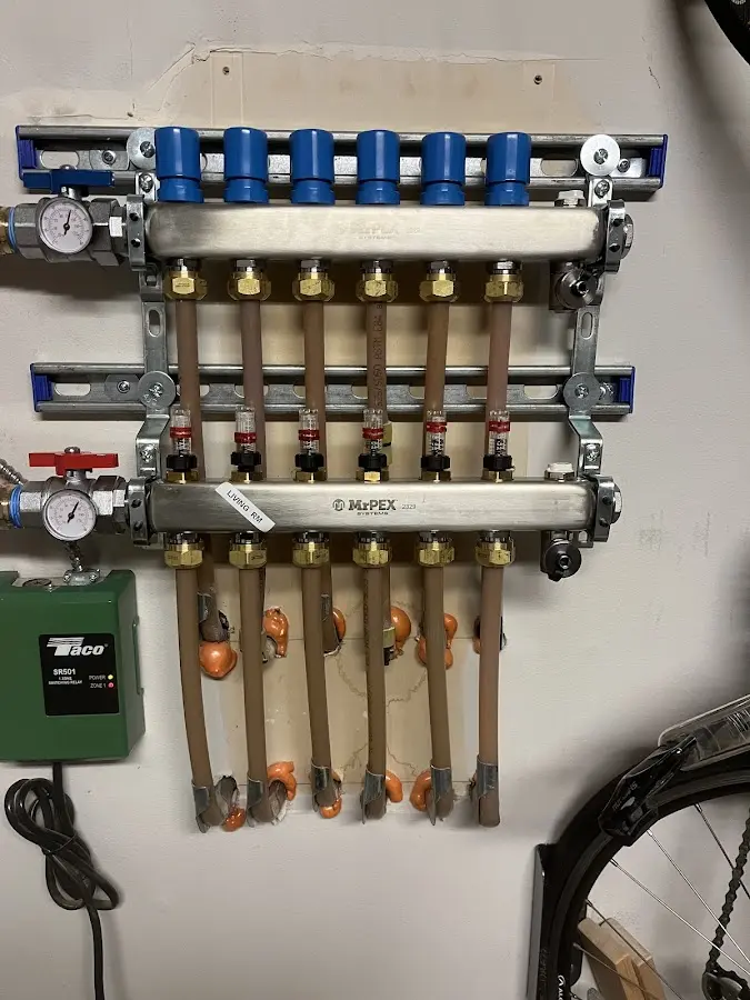 Plumber performing Gas Line Installation at a residential property in Navarre